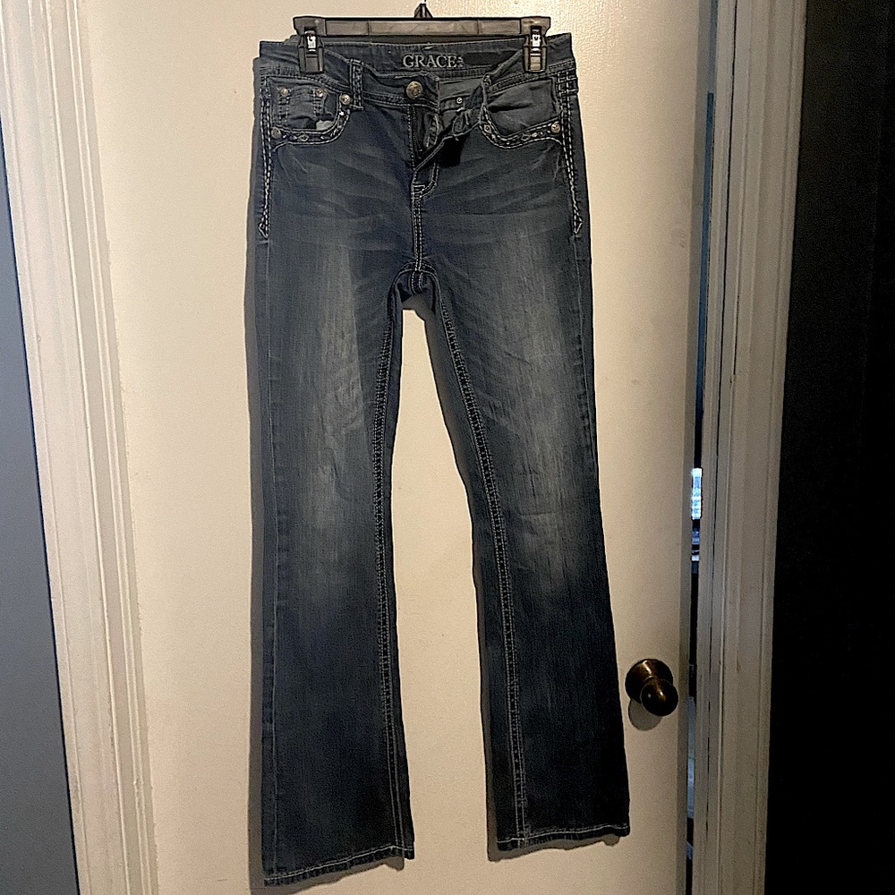 Barely worn, not rips or holes. Size 28x Regular